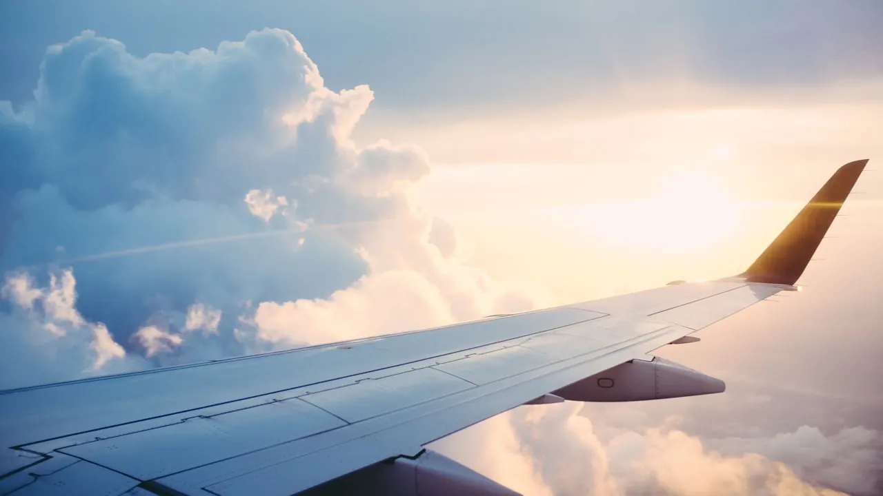 View of an aeroplane wing through the window during a flight